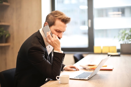 man having phone call in office